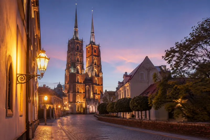 Wrocław at night with illuminated historic buildings and streets in the Old Town.