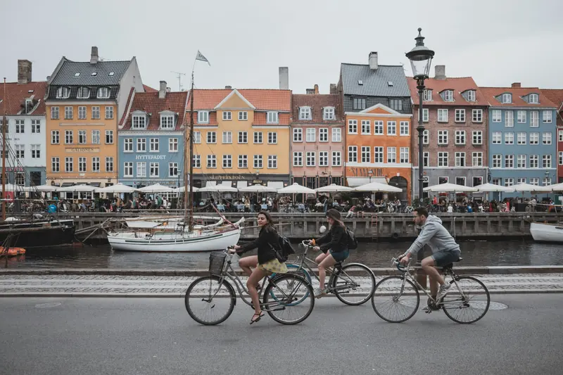 People riding bikes near Nyhavn, Copenhagen