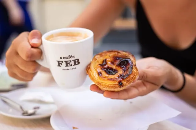 Fresh pastel de nata being made at Manteigaria’s open kitchen.