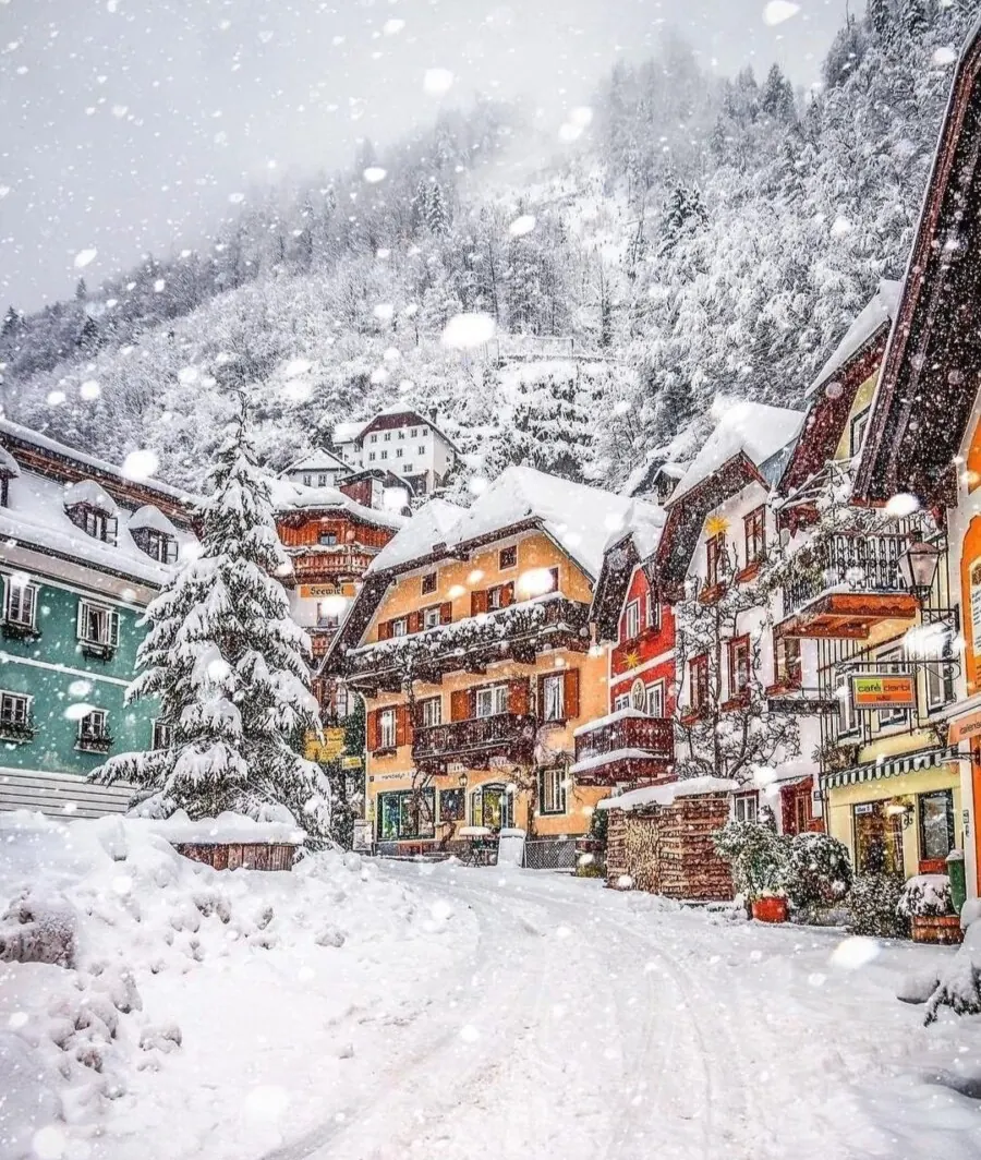 Pastel houses capped with snow