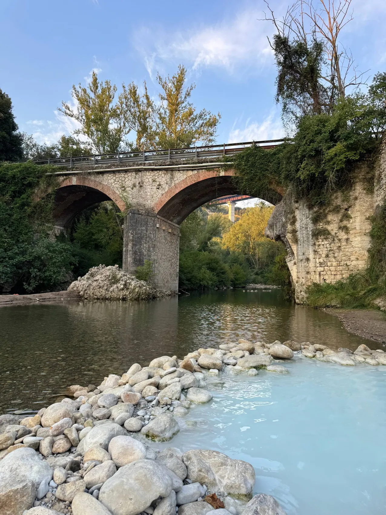 The Farma River, flowing right beside the pools