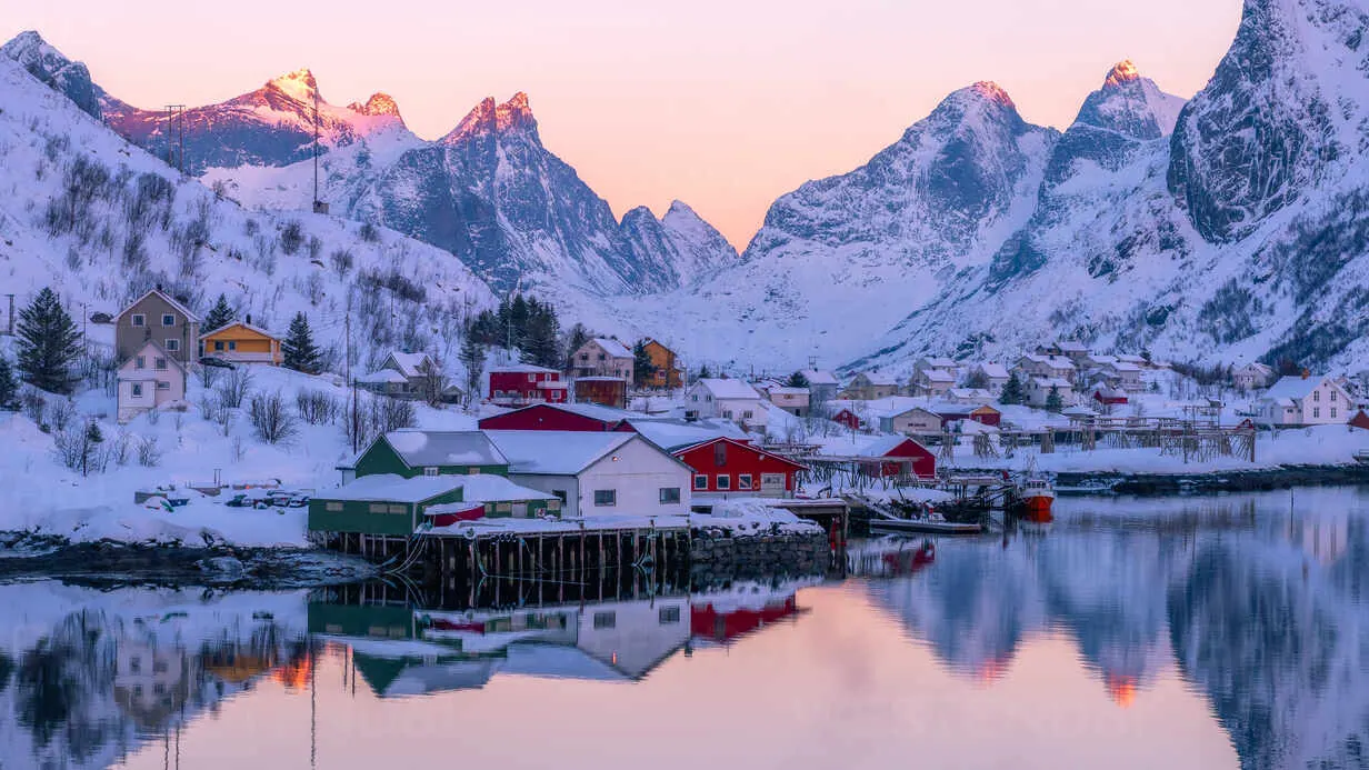 Under snow, it’s hauntingly beautiful — red cabins (called rorbuer) dot the shoreline