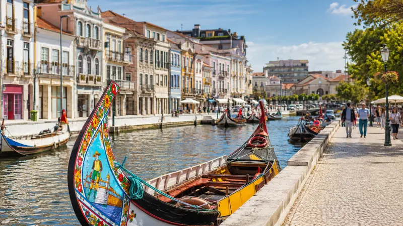 Colourful moliceiro boats on the canal in Aveiro, Portugal