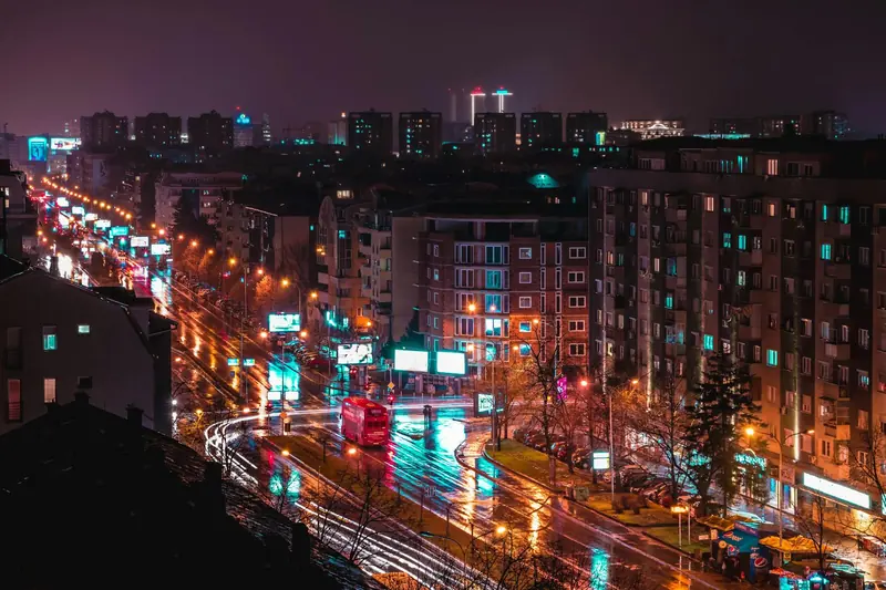 Night view of Skopje city with illuminated streets and traffic in North Macedonia