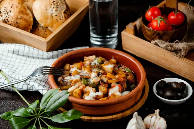 An illustrative Portuguese food dish with wine.