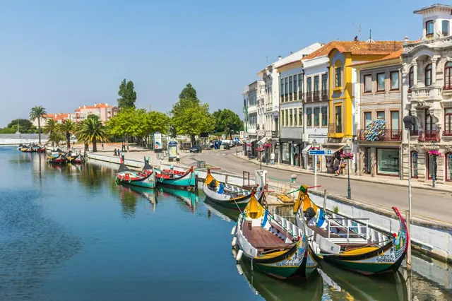 Aveiro canals, boats and colourful buildings.