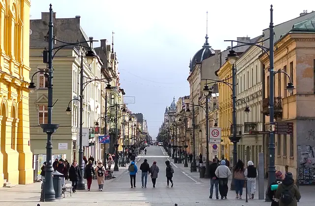 Piotrkowska Street seen from Freedom Square in Łódź, Poland. Destination context, not a photograph of this tour.